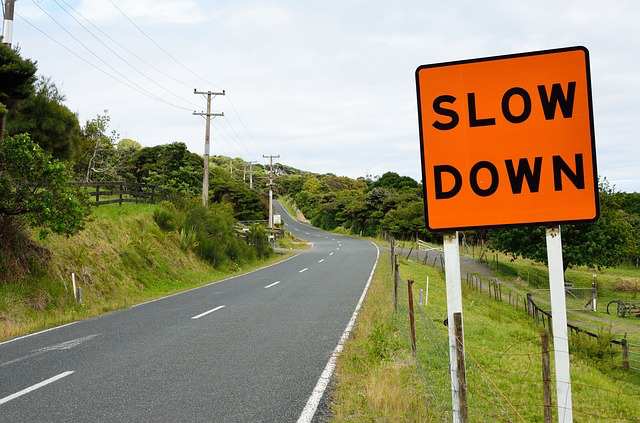 slow-down-road-sign